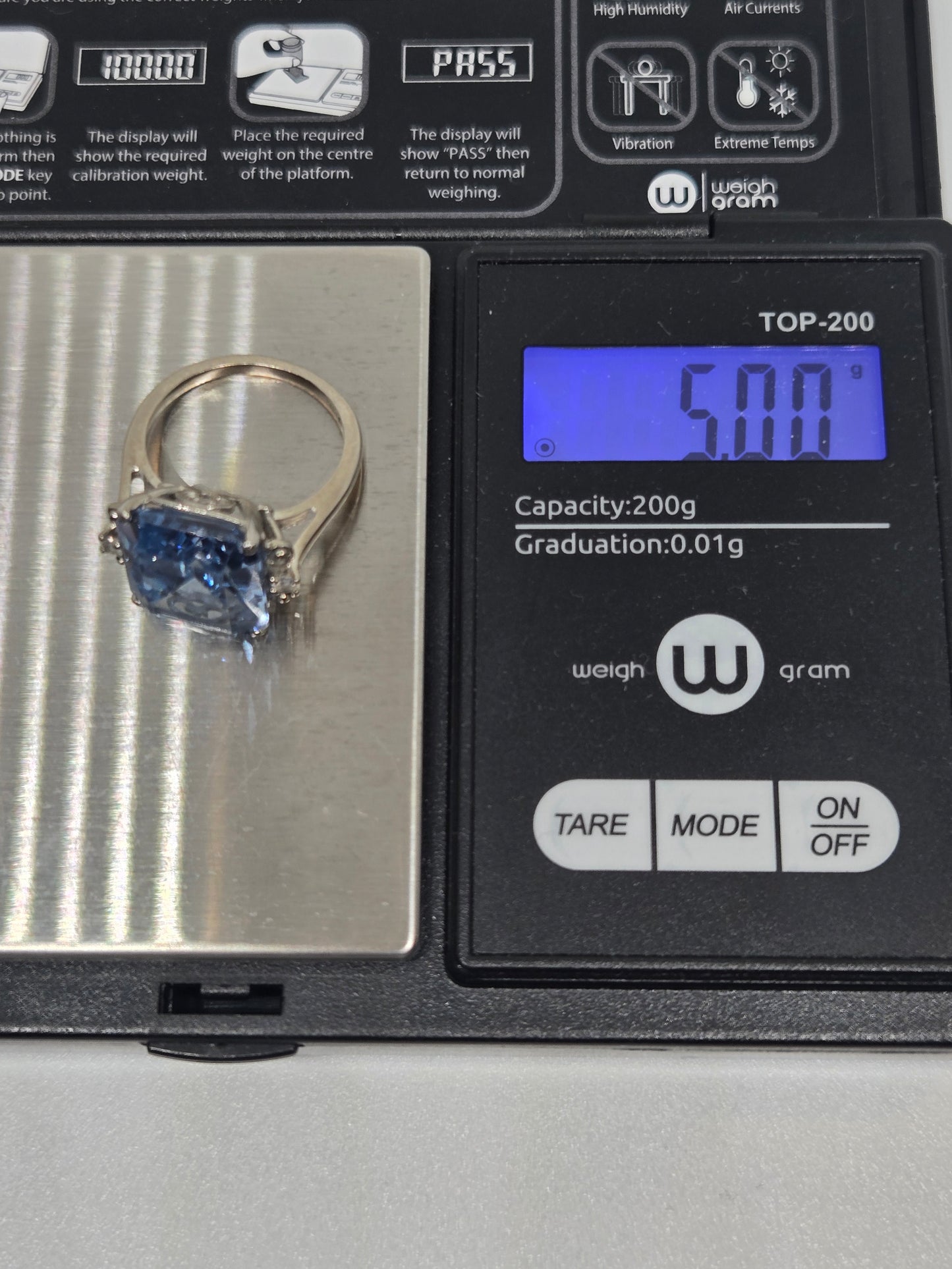 Blue Topaz Emerald Cut Cocktail Ring w/ Crystal Accents in White Gold
