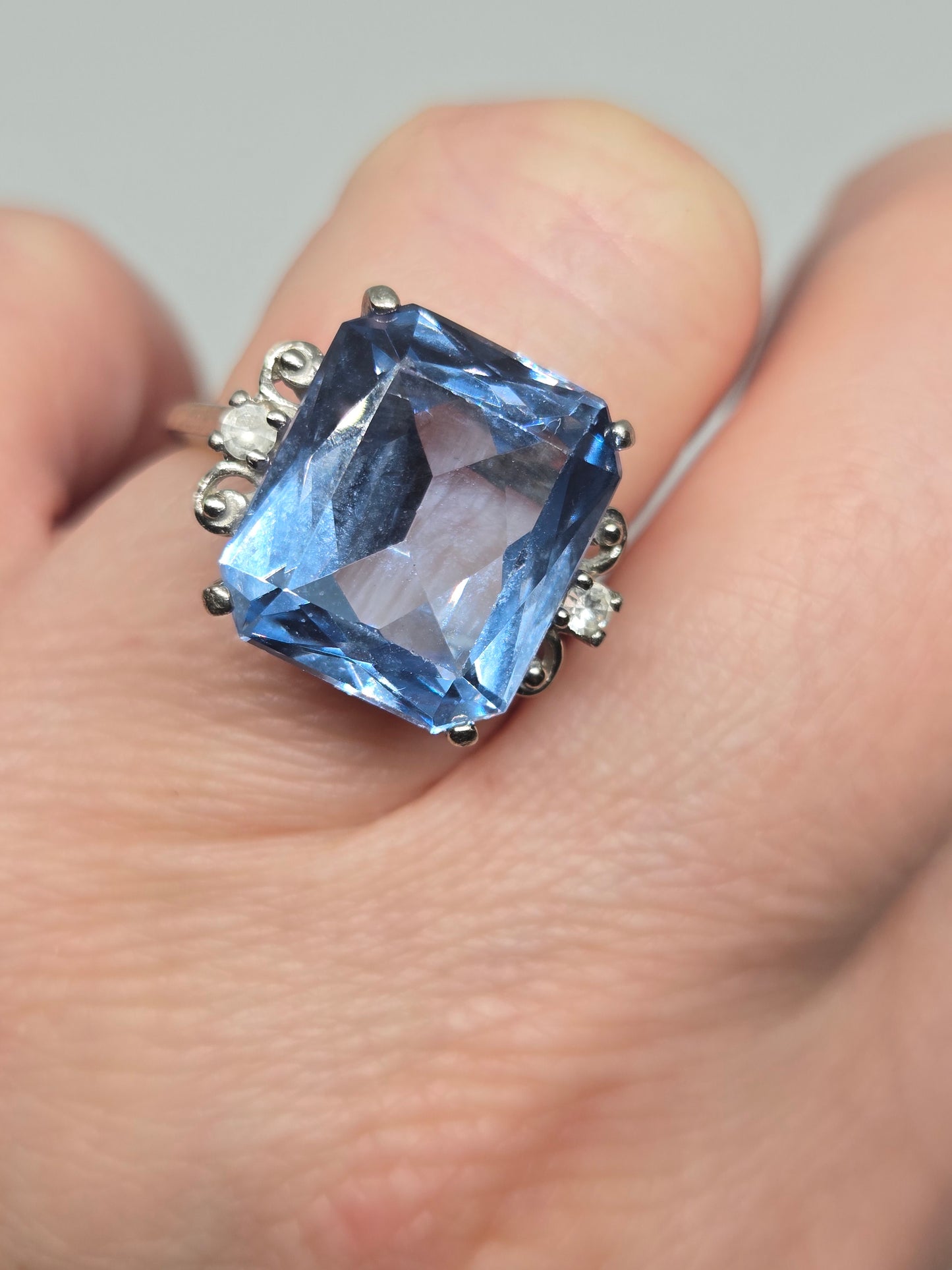 Blue Topaz Emerald Cut Cocktail Ring w/ Crystal Accents in White Gold