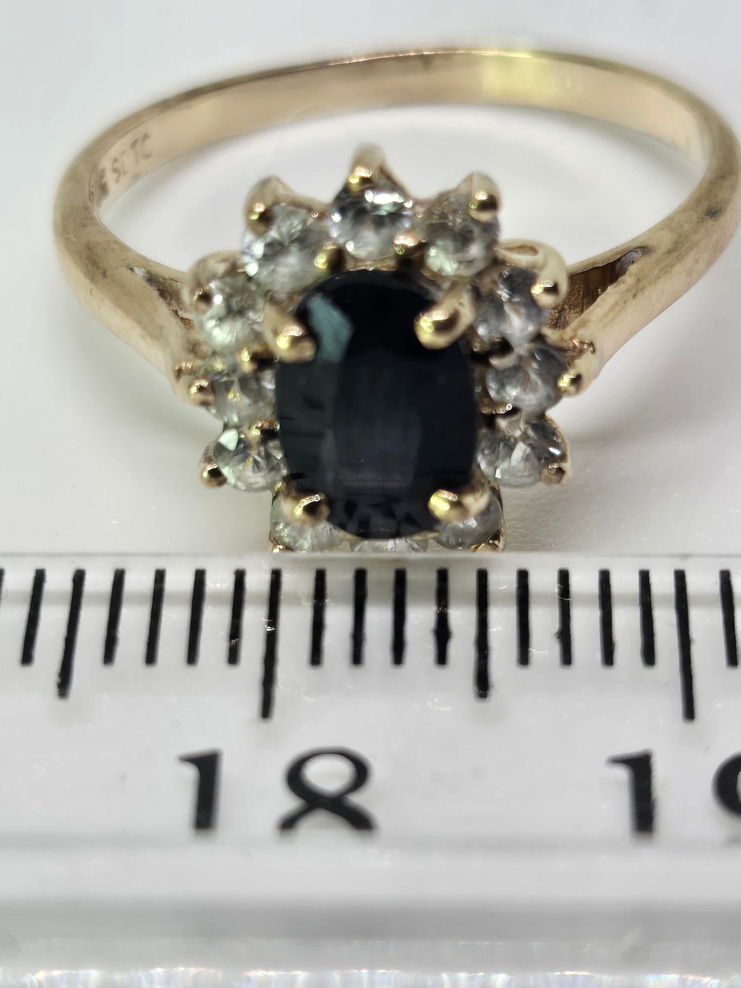 Black Sapphire Halo Ring in Yellow Gold