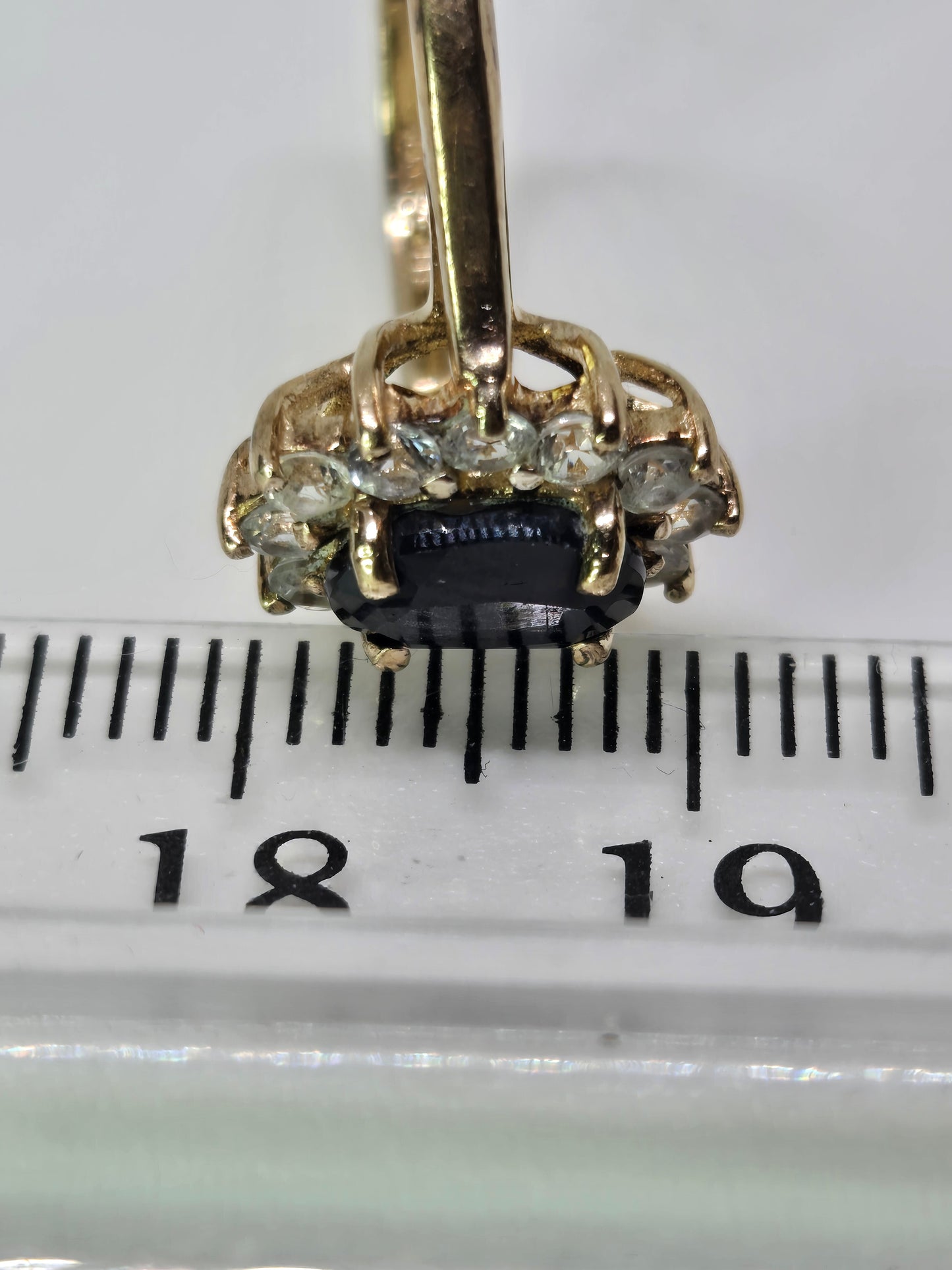 Black Sapphire Halo Ring in Yellow Gold