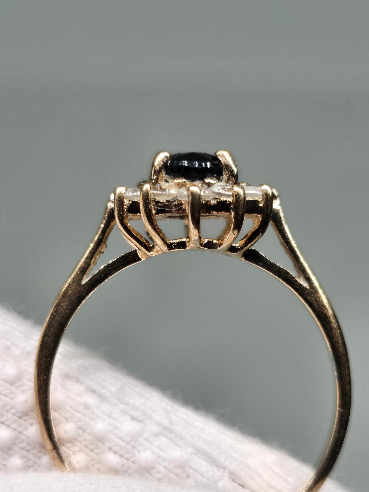 Black Sapphire Halo Ring in Yellow Gold