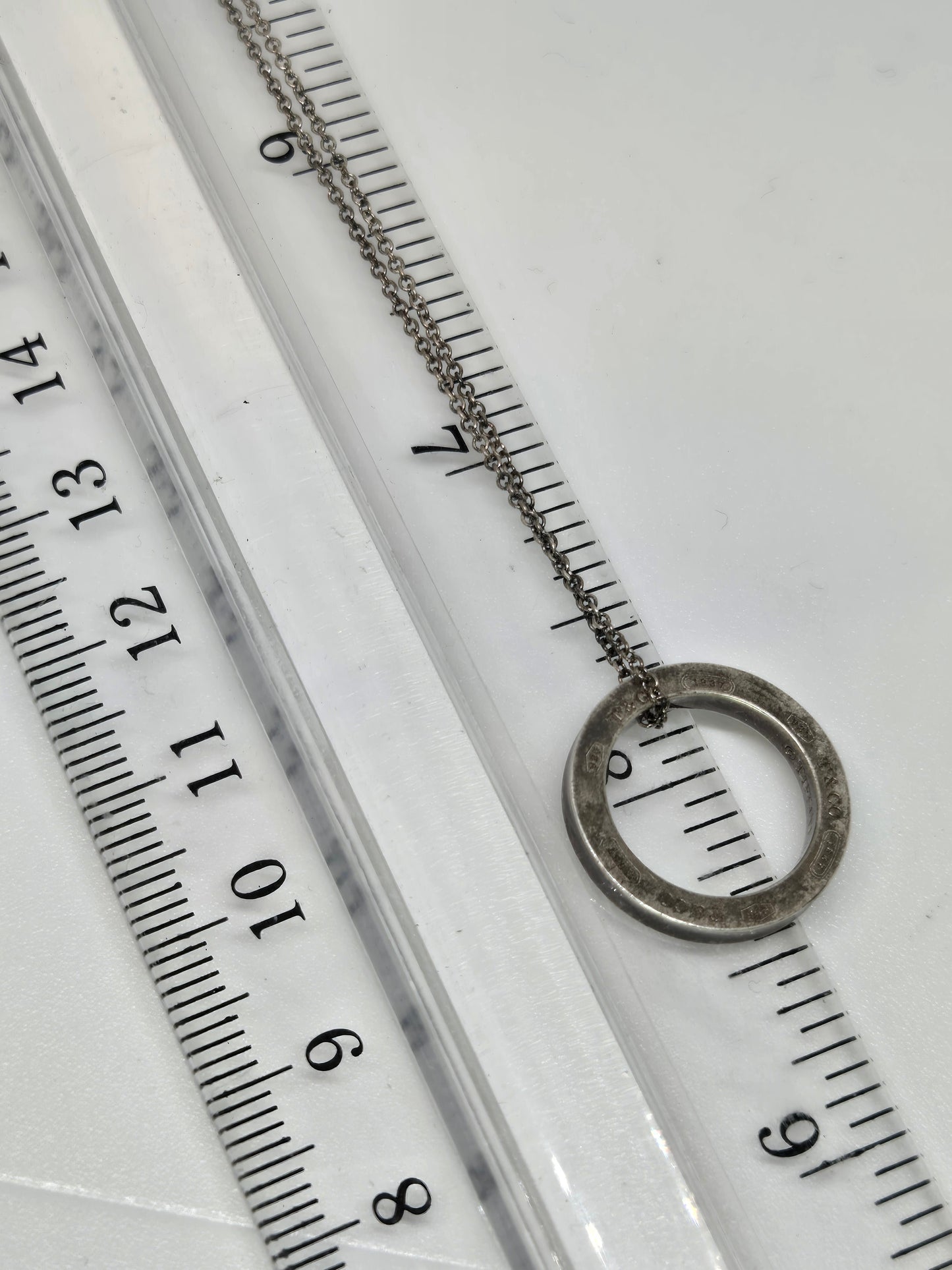 Tiffany & Co. Sterling Silver Circle Pendant Necklace Timeless Designer Jewelry Gift